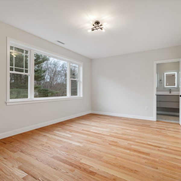 Custom Home Builders Burlington MA - Bedroom With Bathroom