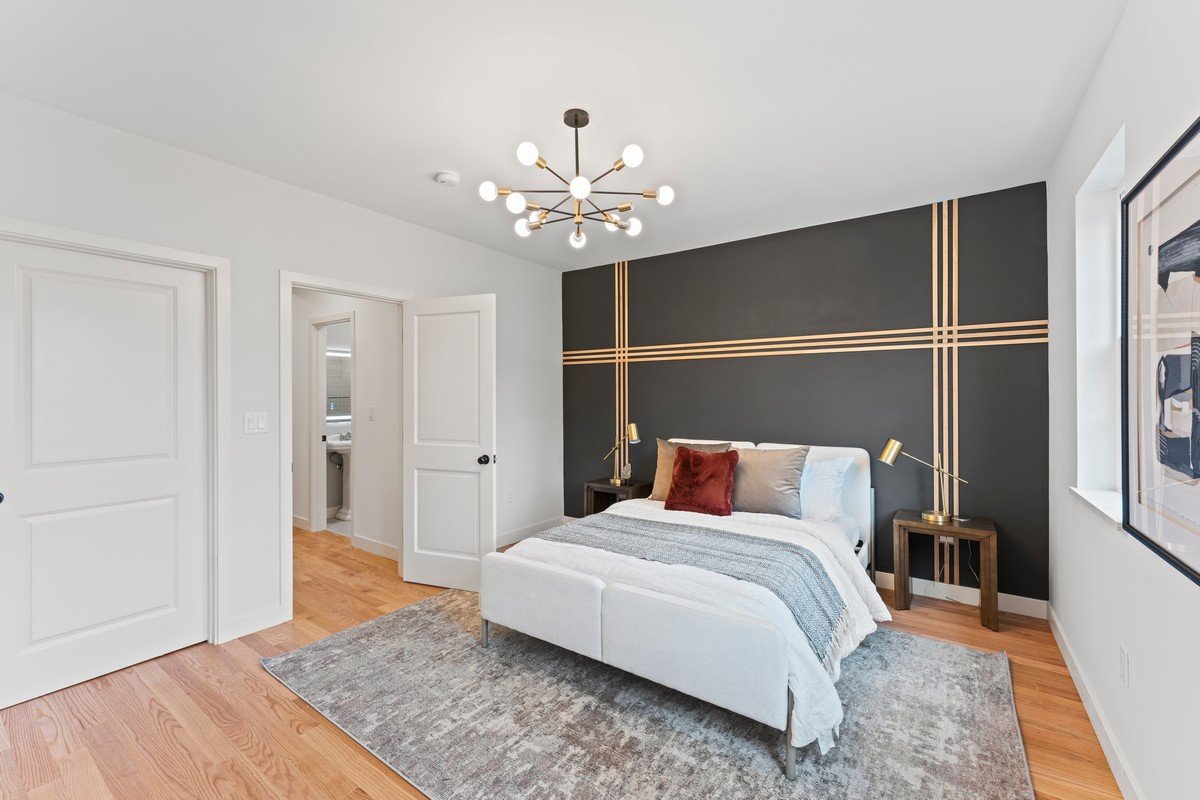 New Construction Duplex in Watertown MA- Bedroom With Black Accent Feature Wall
