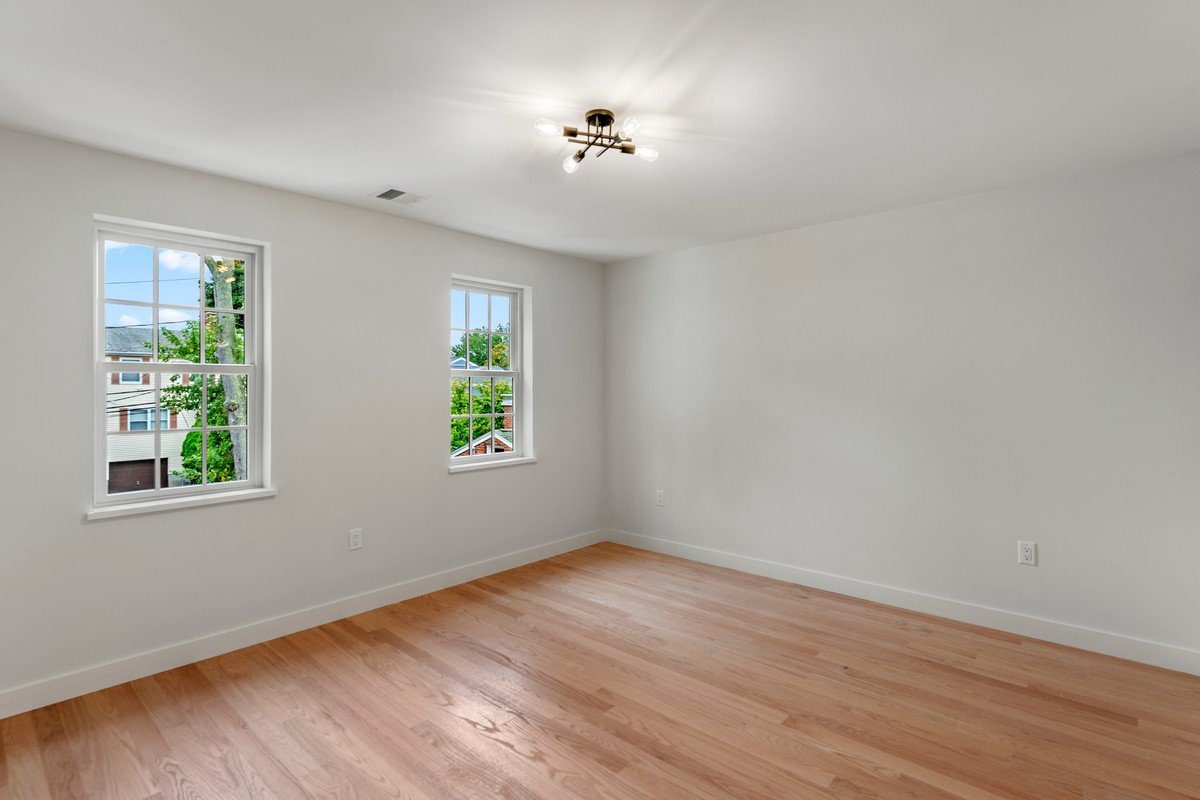 New Construction Duplex in Watertown MA-Bedroom With Modern Lighting